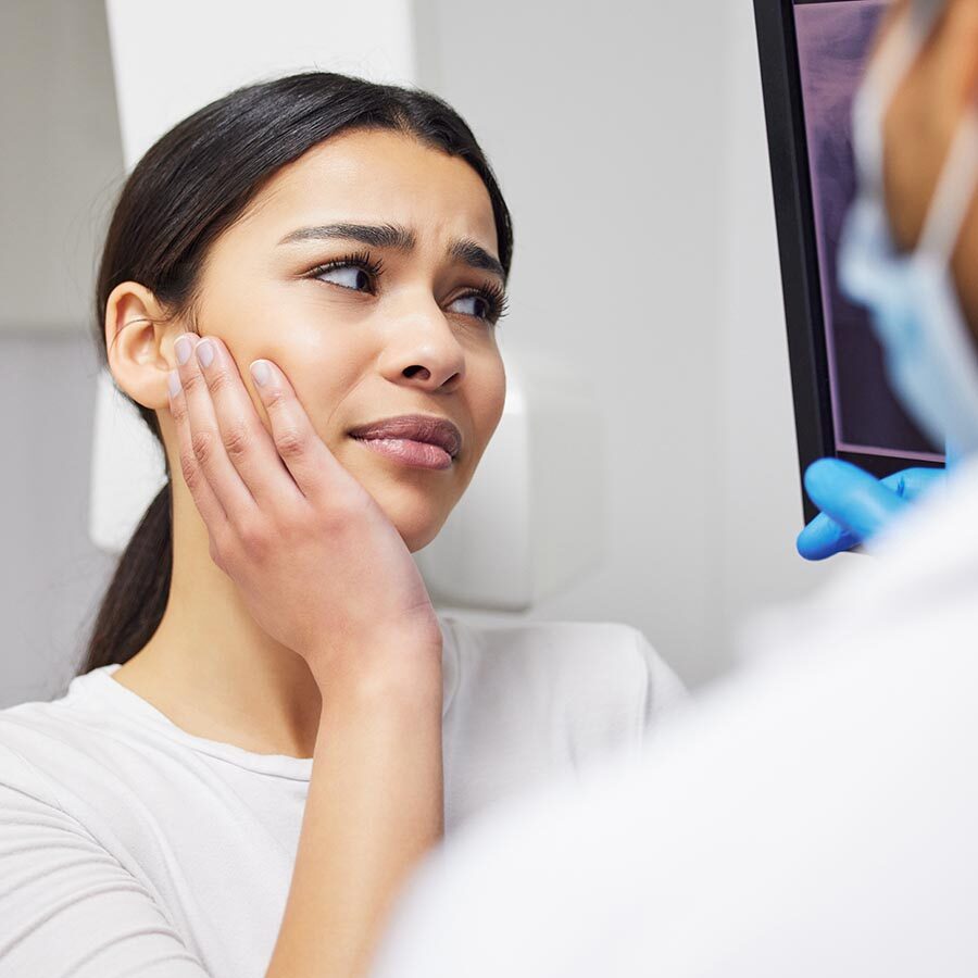 Women Experiencing Toothache